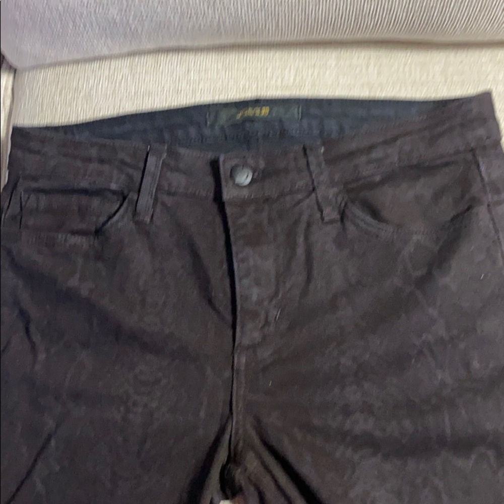 Joe’s patterned brown jeans.